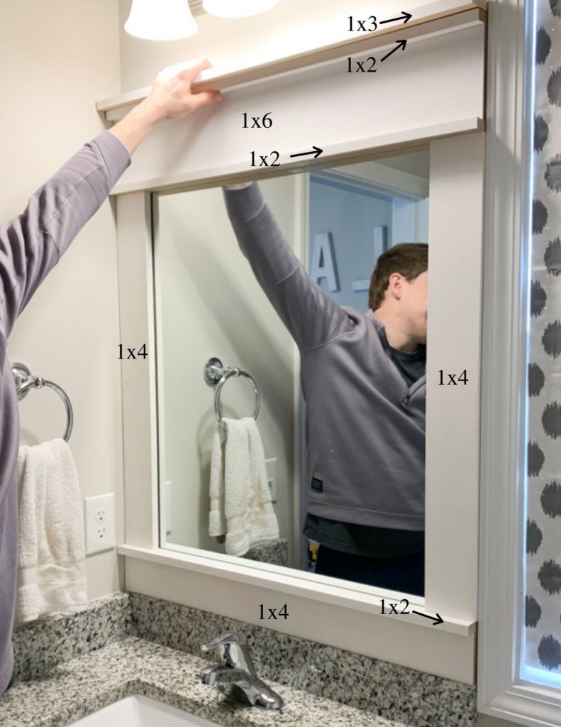 diy: how to frame a builder-grade bathroom mirror - home and hallow