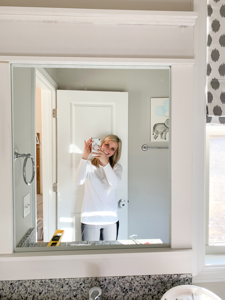How to Make a DIY Bathroom Mirror Frame - TheDIYPlan