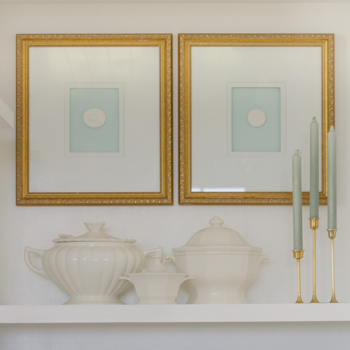 set of two DIY framed intaglio on white shelves 