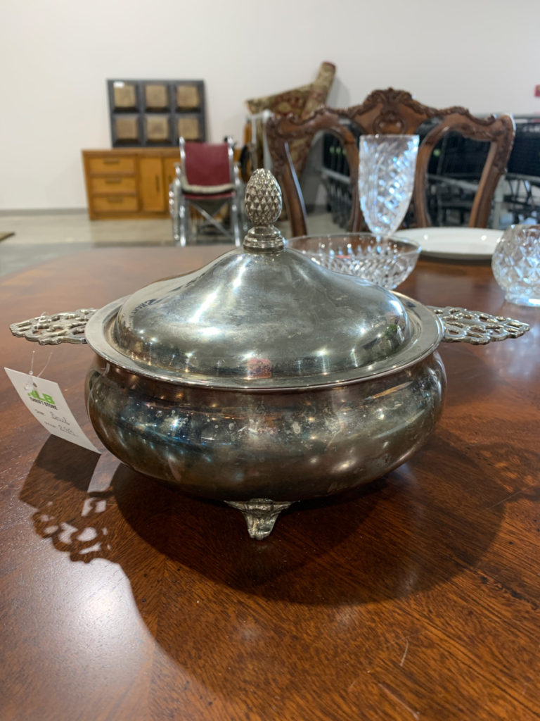vintage silver plated tureen for sale in a thrift store