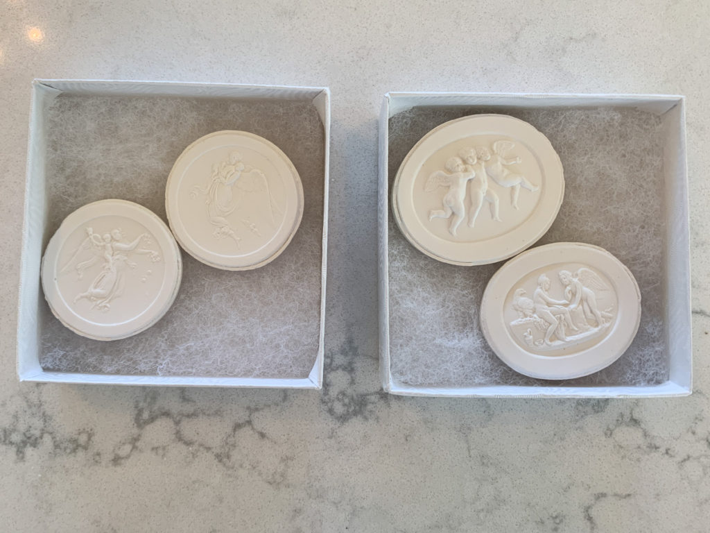 four reproduction intaglios in boxes