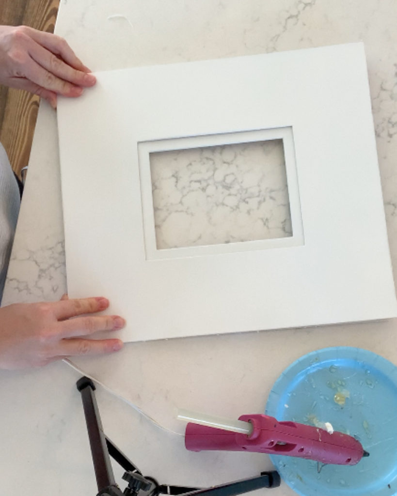 a white picture mat for a DIY framed intaglio