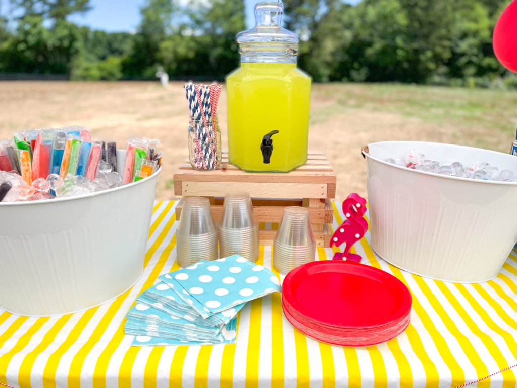 drink station at a summer waterslide birthday party 