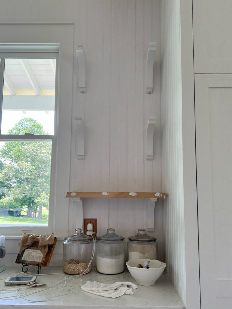 building open shelves with corbels in a kitchen 