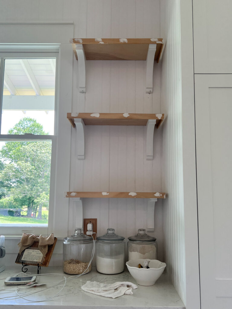 building open shelves with corbels in a kitchen