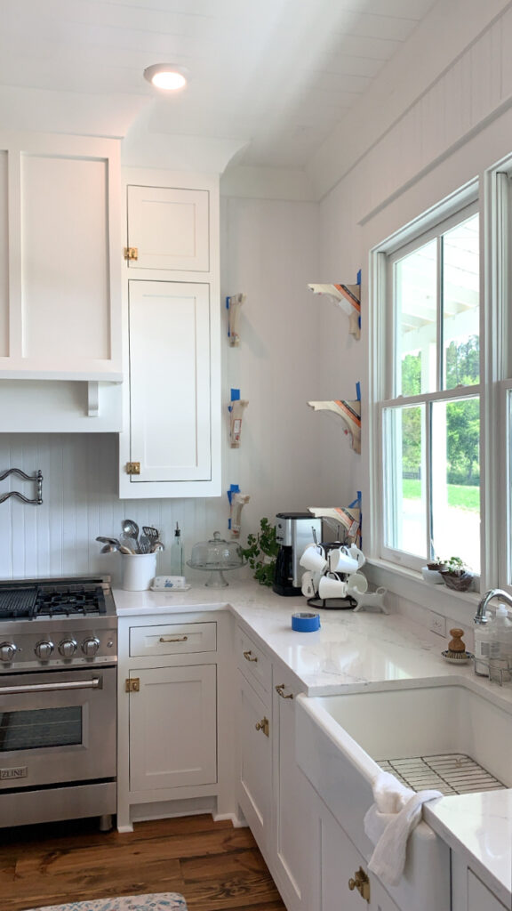 how to build open shelves in a corner of a kitchen with corbels 