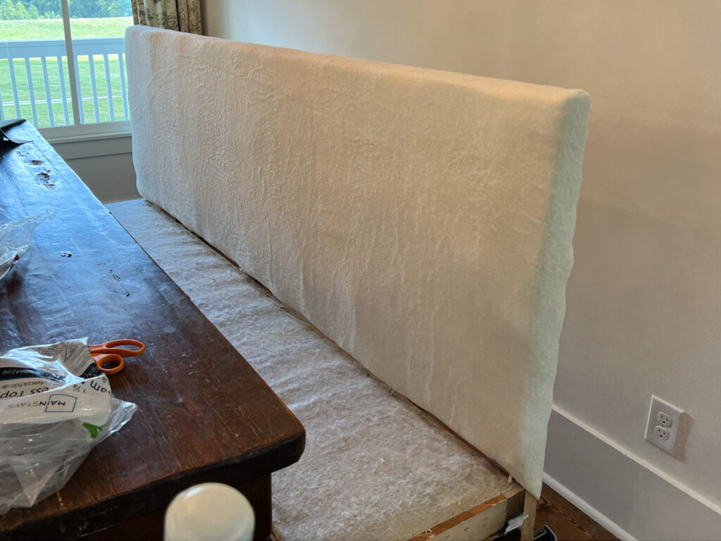 the construction process of a DIY banquette bench